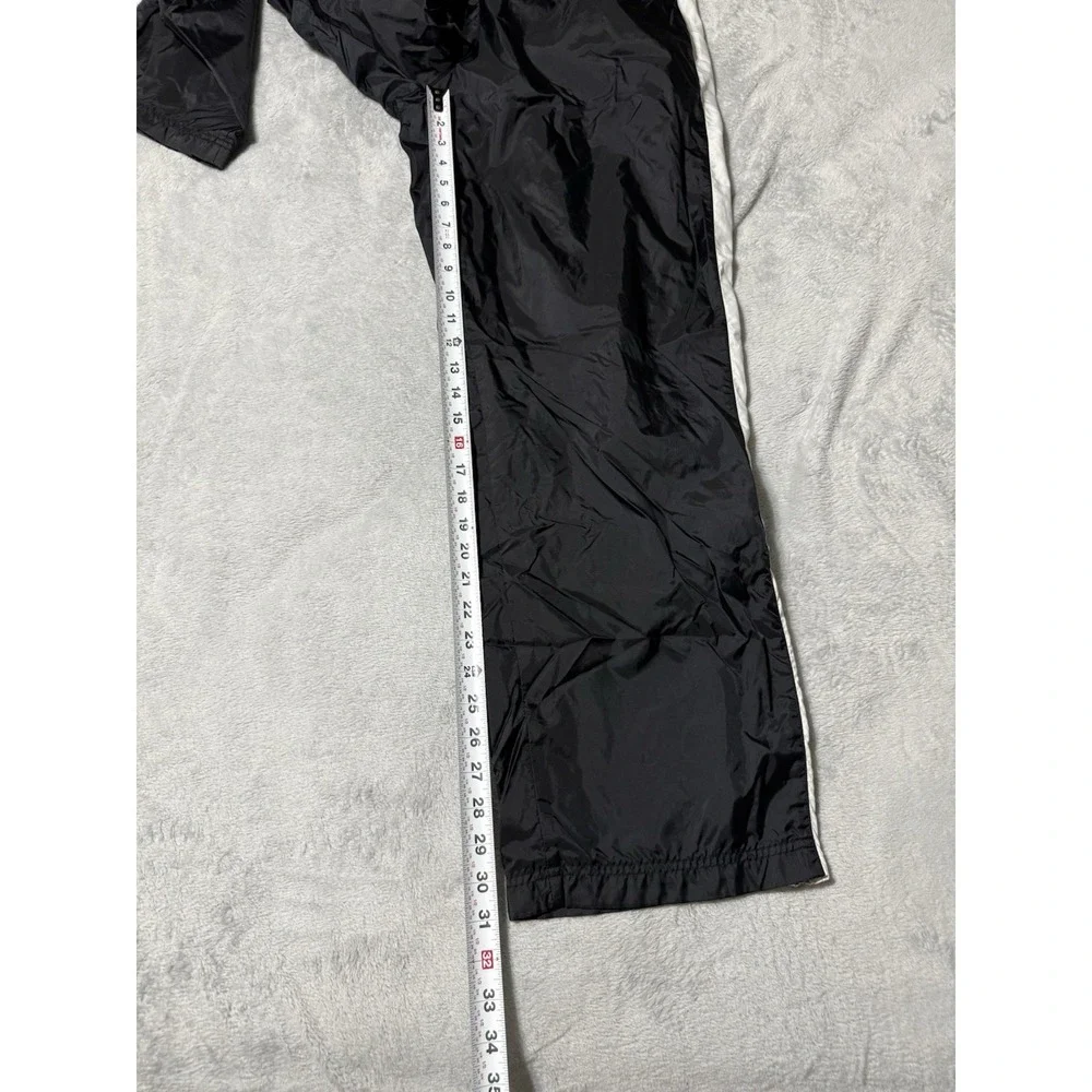 VTG Nike Mens XL Track Pants Windbreaker Black Nylon Ankle Zip Running